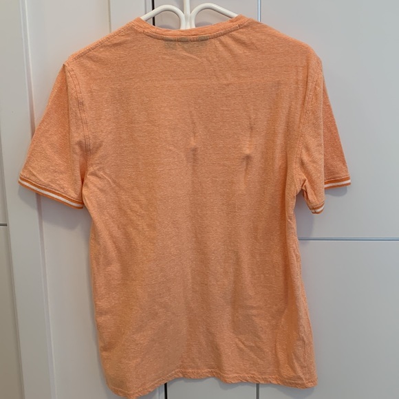 Orange tshirt with front pocket - Picture 2 of 2